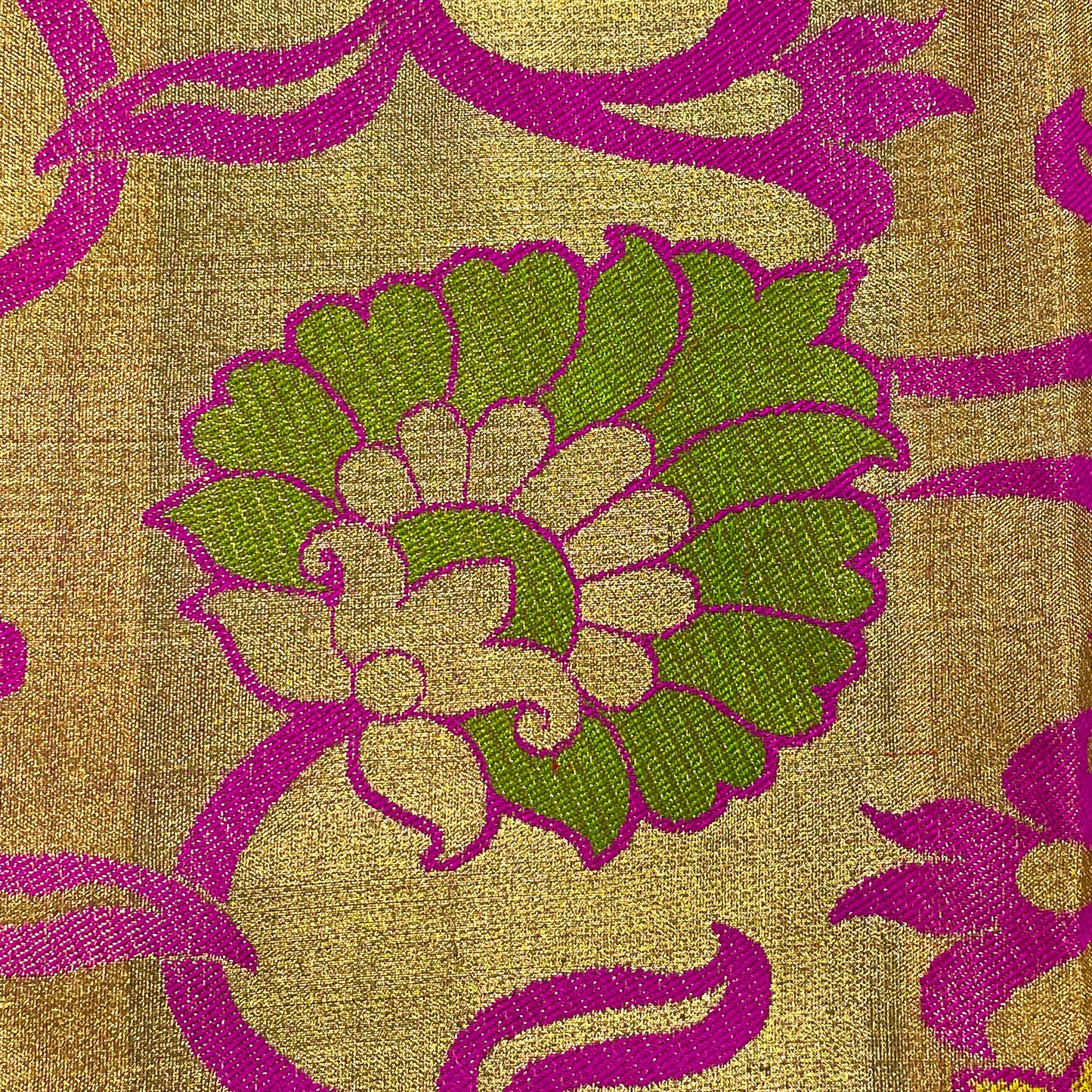 Gold zari Kanjivaram Silk Saree With Floral motifs.