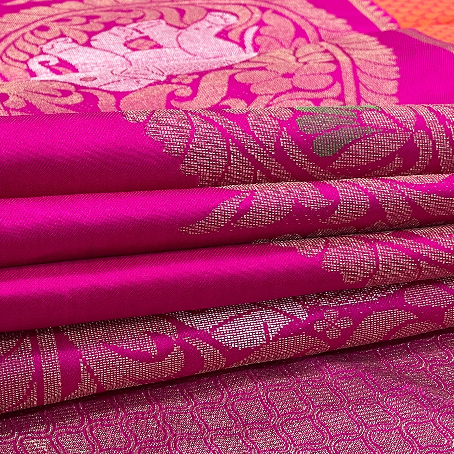 Orange Pure Kanjivaram Silk Saree With Rani Pink Border.