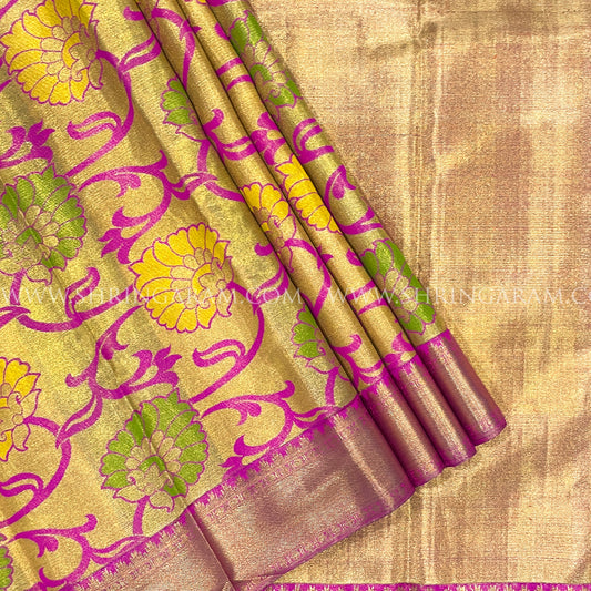 Gold zari Kanjivaram Silk Saree With Floral motifs.