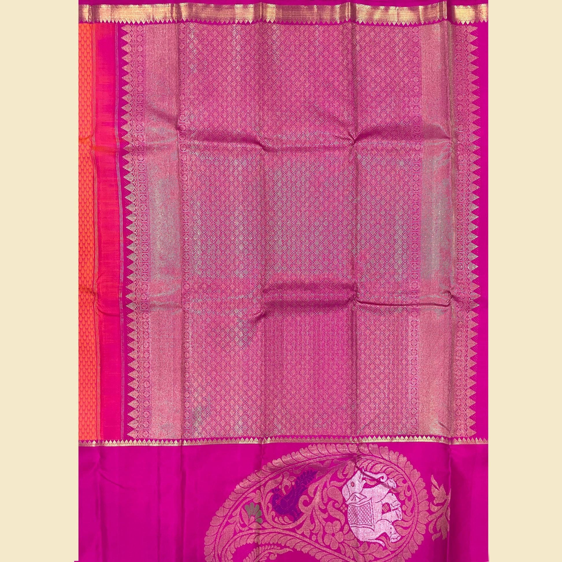 Orange Kanjivaram Silk Saree With Rani Pink Border.
