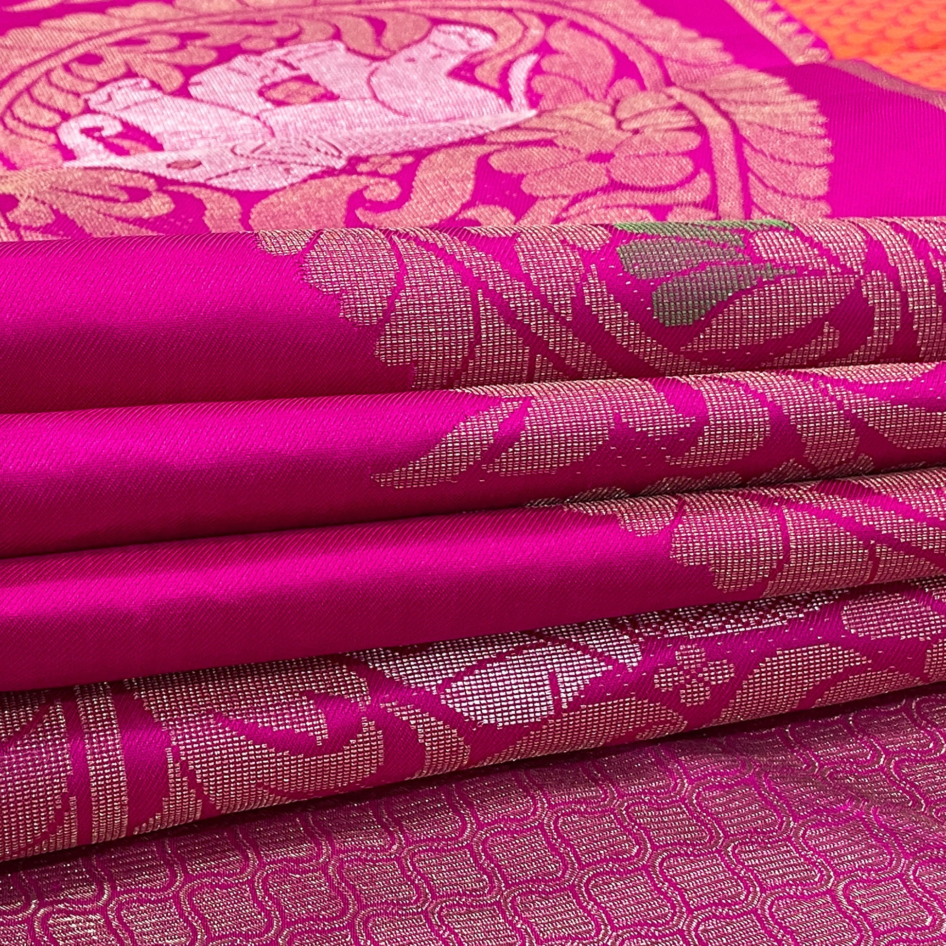Orange Kanjivaram Silk Saree With Rani Pink Border.