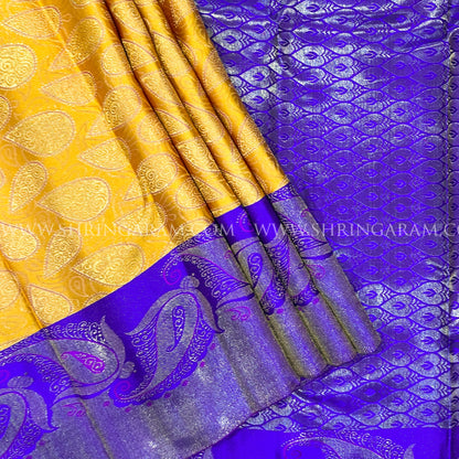 Mustard Yellow With Purple Border And Gold Zari Work.