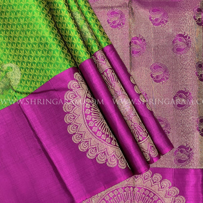 Leaf Green Kanjivaram Silk Saree With Rani Pink Border