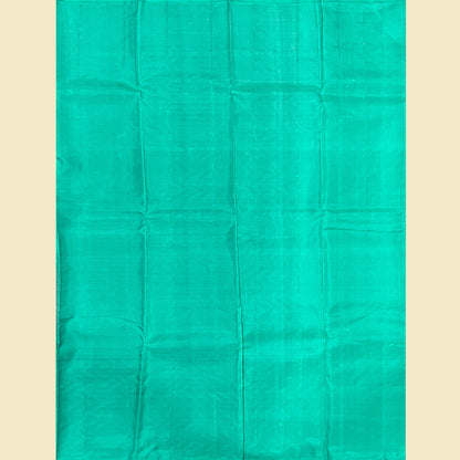 Kanjivaram Silk Saree With Turquoise Blouse.