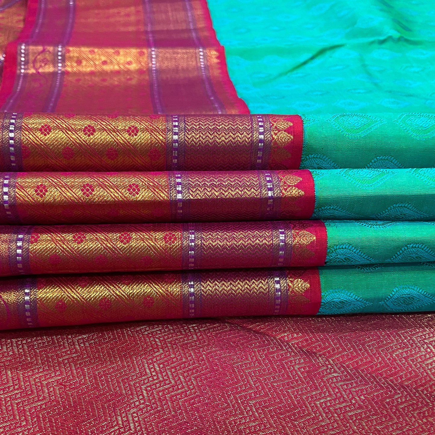 Aqua Green Kanjivaram Silk Saree With Pink-Gold Zari Border