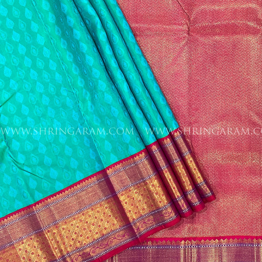 Aqua Green Kanjivaram Silk Saree With Pink-Gold Zari Border